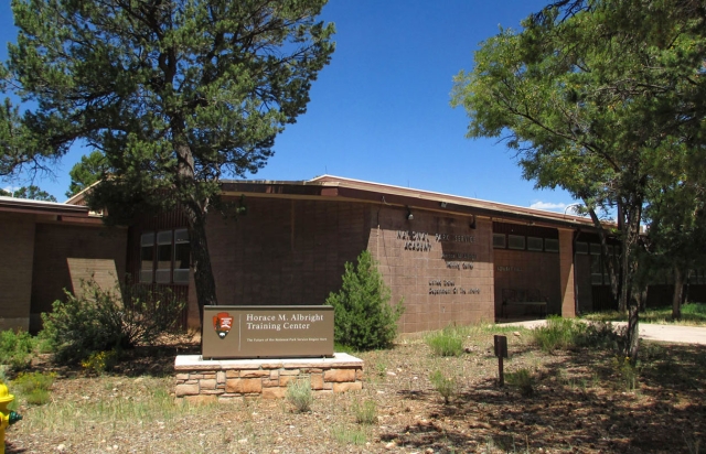 A brown building with a sign saying "Horace M. Albright Training Center"