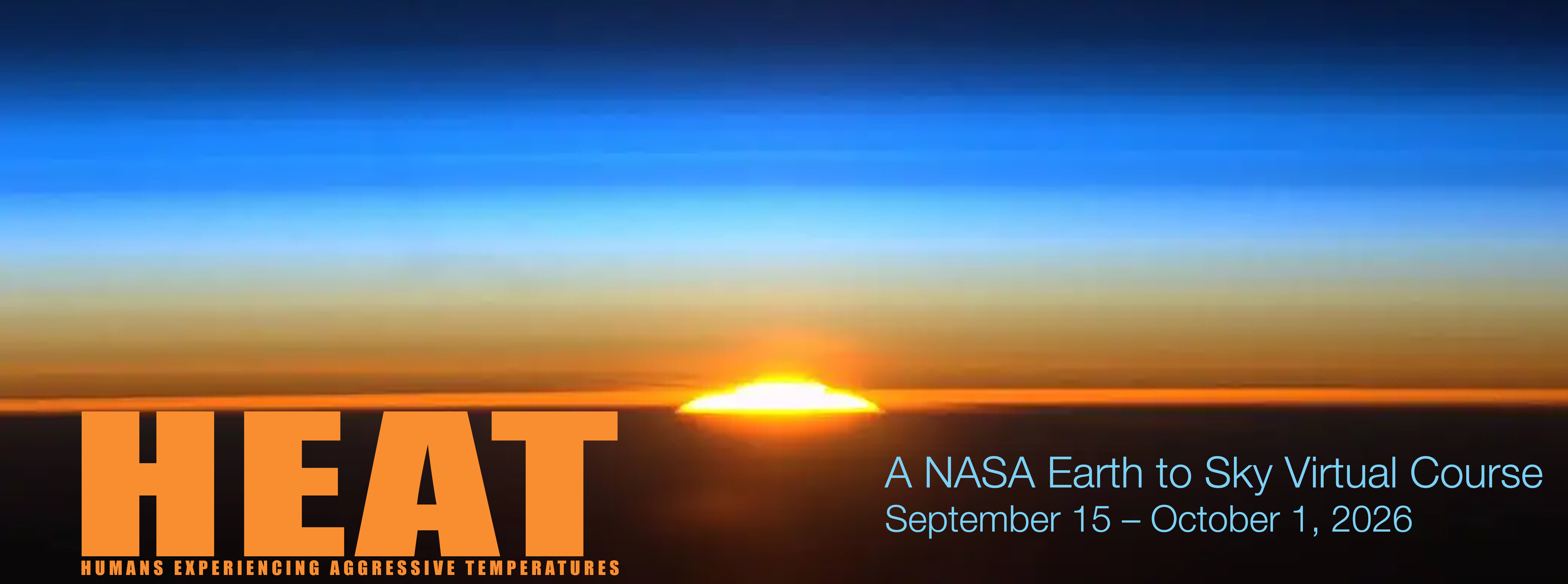 Against a rippled blue and orange sky, a bead of intense sunlight heralds the sunrise.
